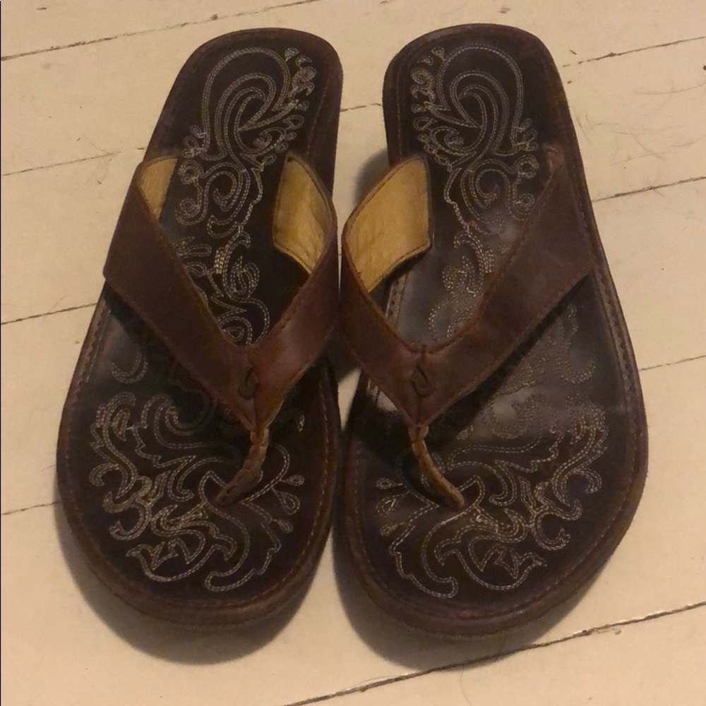 OluKai brown leather wedges size 6.